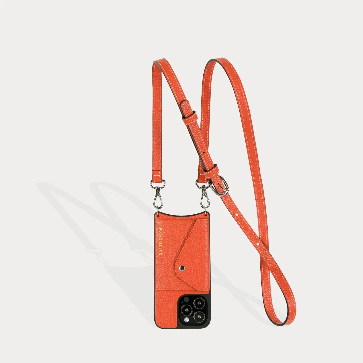 Casey Side Slot Pebble Leather Crossbody Bandolier - Orange/Silver