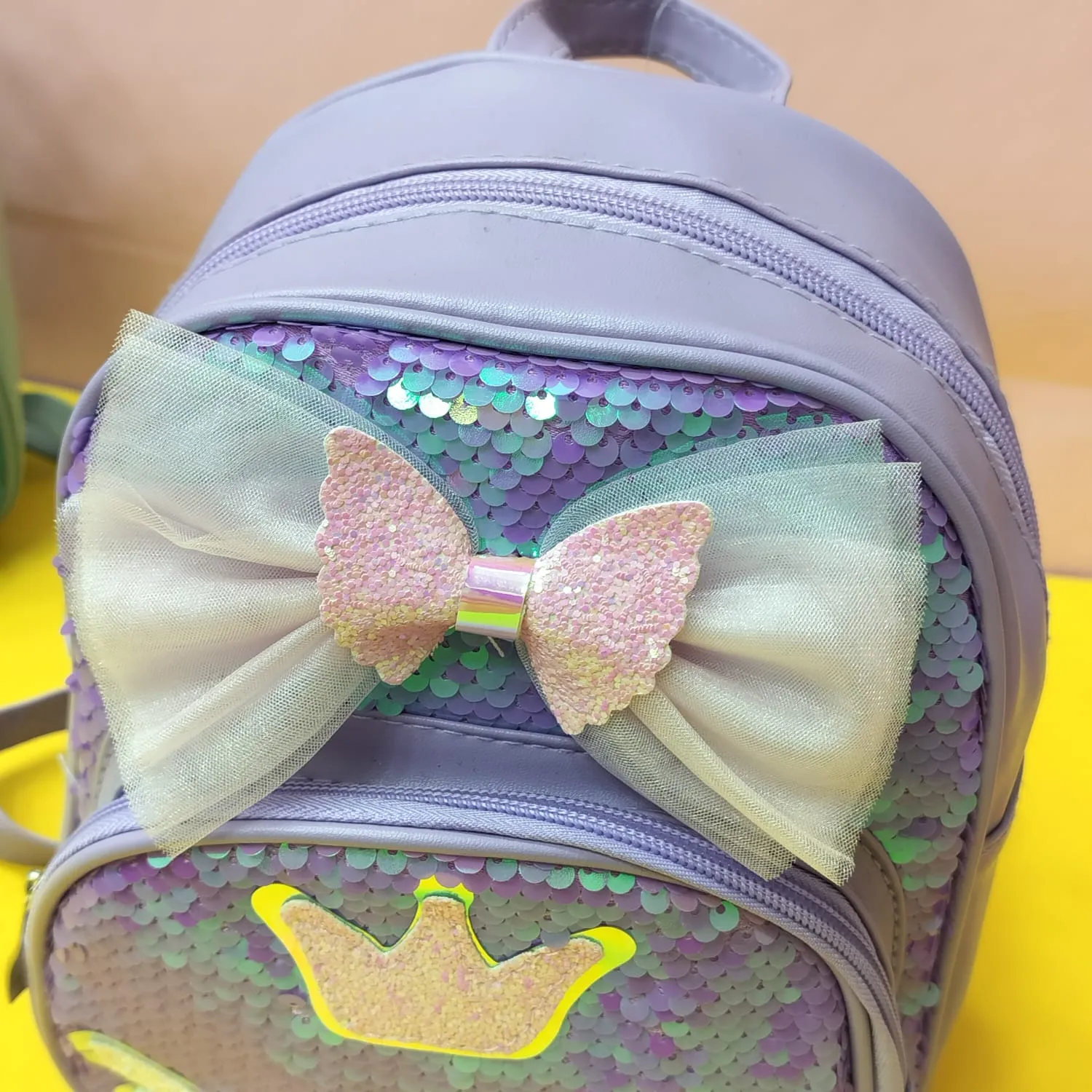 Mini Sequence Bow Backpack.