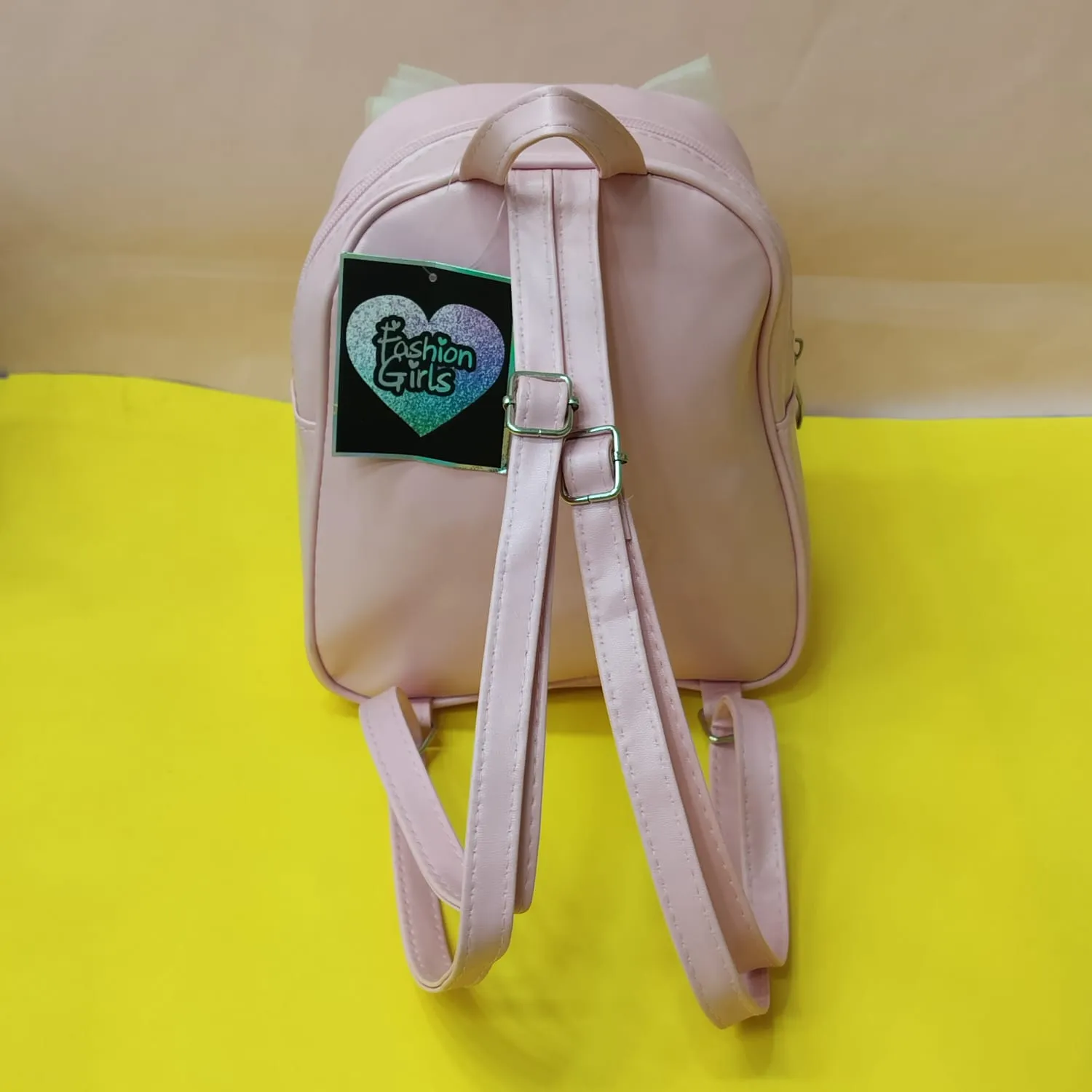 Mini Sequence Bow Backpack.