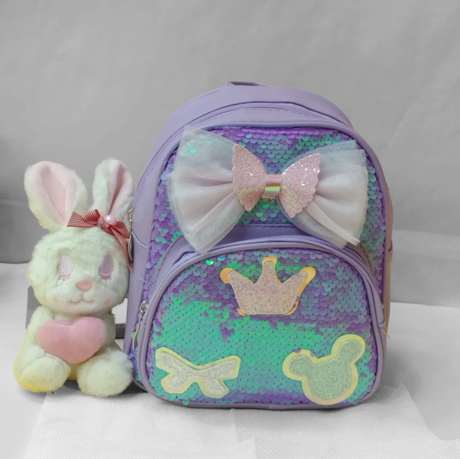 Mini Sequence Bow Backpack.