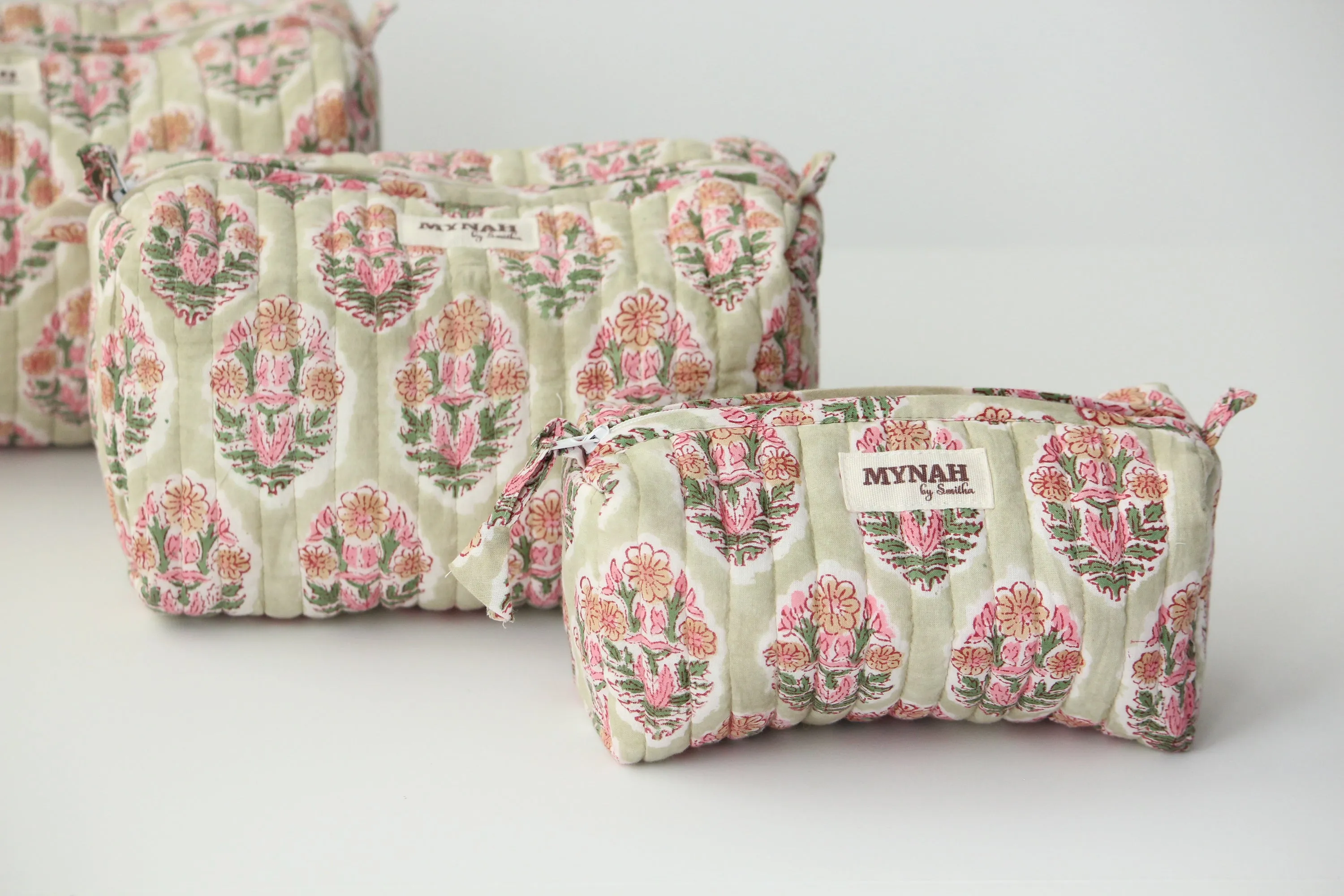 'PISTACHIO BOUQUET green with pink motifs' printed travel/makeup zipper pouch-set of 3